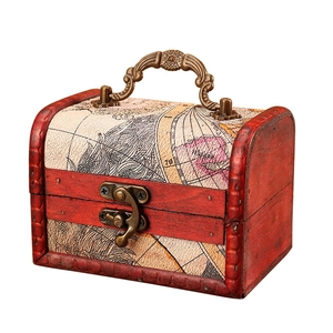 Vintage wooden gift box with world map pattern, bronze handle and secure latch detail