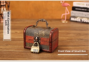 Close-up of vintage wooden jewelry box with bronze handle and 3-digit combination lock