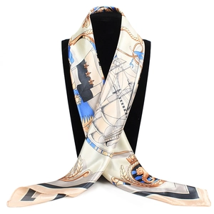 Detail of 90x90cm nautical printed satin silk scarf featuring navy flags and sailboats