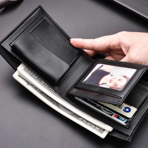 Detailed interior of a men's black PU leather wallet showing card slots and cash compartments
