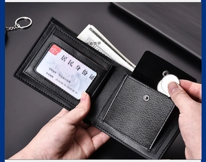 Macro view of men's leather wallet interior featuring clear ID slot and coin pocket