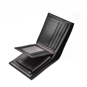 Detailed interior of minimalist black leather bi-fold wallet showing card slots and ID window