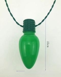 Close-up of a green LED bulb pendant with a 6.65cm height for Christmas lighting