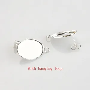 Macro view of silver stainless steel teardrop earring base with hanging loop for DIY jewelry
