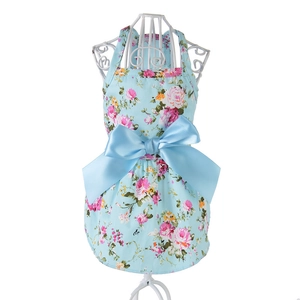Light blue floral cotton pet dress with a satin bow on a metal hanger for dogs