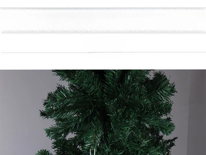 Detailed macro view of dense dark green artificial pine branches for Christmas decor