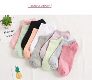 Macro display of assorted pastel cotton boat socks in 10 colors for women