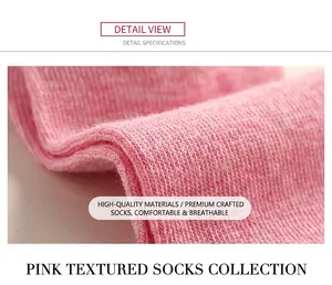 Detailed macro texture of pink knitted cotton socks showing breathable fabric weave