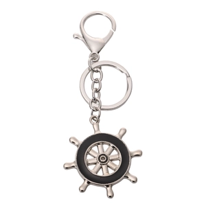 Silver nautical helm keychain with black circular accent on a lobster clasp ring