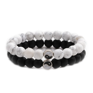 Couple bracelets set with white turquoise beads and black matte onyx beads with yin yang