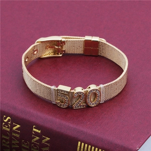Detail of 10mm golden mesh bracelet featuring a sparkling 520 zircon charm on red background