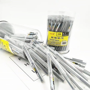 Detailed view of 0.7mm 2B resin pencil leads scattered with transparent storage tubes