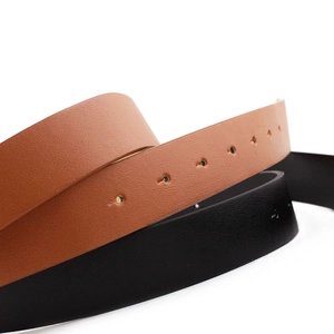 Set of minimalist black and brown faux leather belts with circular buckles for women