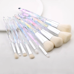 Detail of 10-piece crystal makeup brush set featuring diamond-cut transparent laser handles