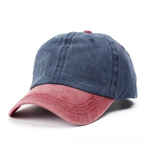 Détail d'une casquette de baseball en coton délavé avec visière contrastée et coutures
