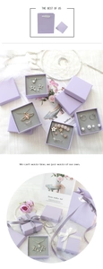 Detailed view of lavender jewelry gift box sets with matching elegant paper bags