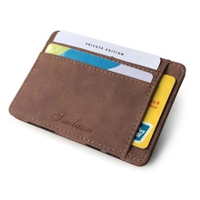 Close-up of brown trifold wallet with multiple card slots and embossed logo detailing