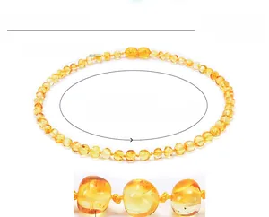 Detailed size parameter view of Baltic amber teething necklace with golden beads for babies