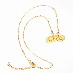 Detail showing the 18K gold plated bicycle pendant with lobster clasp and adjustable chain