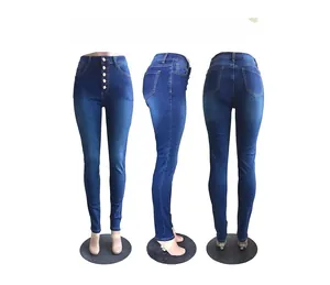 Detail show of high-waisted slim fit skinny jeans with a five-button fly closure in dark blue