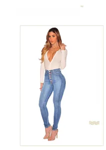 Detail of high waisted skinny jeans with multi-button closure and white V-neck ribbed top