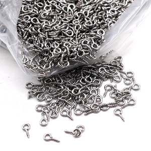 Macro view of bright silver screw eye hooks for DIY jewelry and manual crafts