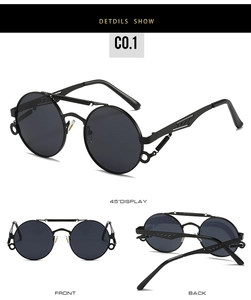 Macro detail of steampunk round sunglasses showing metal spring temples and vintage frame