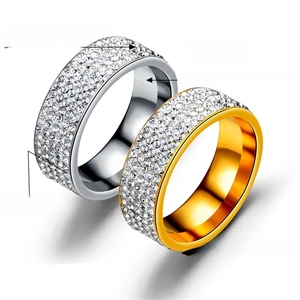 Detail of gold and silver five-row crystal eternity rings with AAA cubic zirconia stones