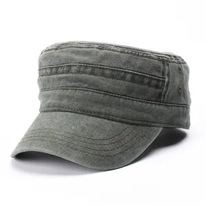 Detail of army green washed canvas military cap featuring reinforced stitching and metal eyelets