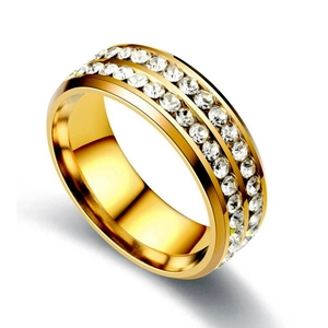Macro shot of gold-plated stainless steel ring with double-row sparkling cubic zirconia