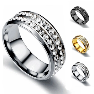 Close-up of double-row rhinestone titanium steel rings in silver, gold, and black colors