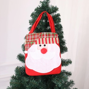 Santa Claus felt gift bag with 3D red nose and green plaid detail for Christmas