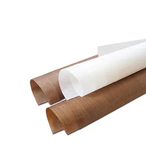 Reusable non-stick PTFE baking sheets in brown and white rolls for oven use