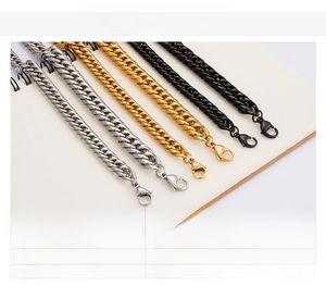 Detailed close-up of 18K gold plated chunky Cuban link bracelets in steel gold and black