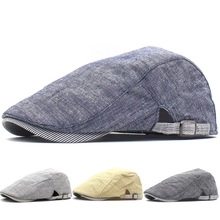 Detail view of denim beret hats showing adjustable metal buckles and multiple color options