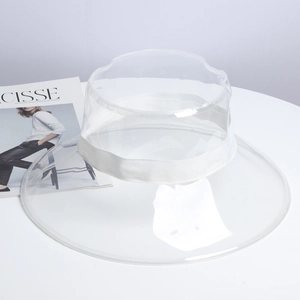 Chapeau bob transparent en PVC à large bord avec ruban décoratif blanc élégant