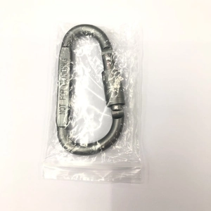 Close-up of gunmetal grey aluminum D-ring carabiner with Not For Climbing text