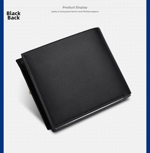 Detail view of the smooth back texture and fine stitching on the black bi-fold wallet