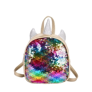 Detail view of kids colorful sequin mini backpack featuring cute unicorn horn and gold trim.