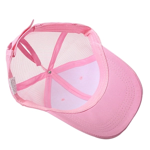 Pink mesh ponytail baseball cap featuring a breathable design and adjustable strap closure