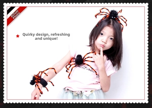 Detail of Halloween spider headband and wristband set with black and orange stripes