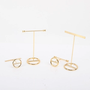 Set of 4 gold metal jewelry display stands with T-bar and circular hooks for earrings