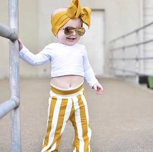 Stylish infant yellow bow headband made of textured fabric, cute baby hair accessory