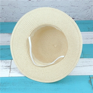 Beige woven straw sun hat with wide brim, chin strap, and sweatband for beach vacation