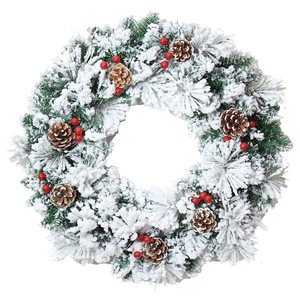 Frosted Christmas wreath with pine cones and red berries on a clean white background