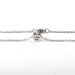 Silver stainless steel heart pendant necklace engraved with I Love You on white background