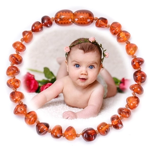 Natural Baltic amber baby bracelet with warm orange beads for teething and decoration