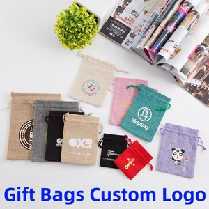 Customizable drawstring gift bags in multiple sizes and colors on a white background