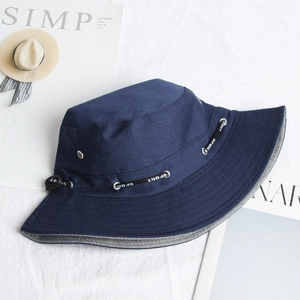 Detail of navy blue cotton sun hat featuring adjustable SPORT drawstring and wide brim