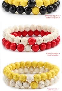 Detail view of colorful turquoise beaded bracelet sets in yellow, black, red, and white